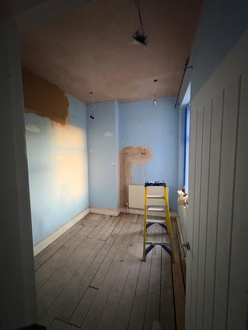First fix wiring during renovation with floorboards lifted